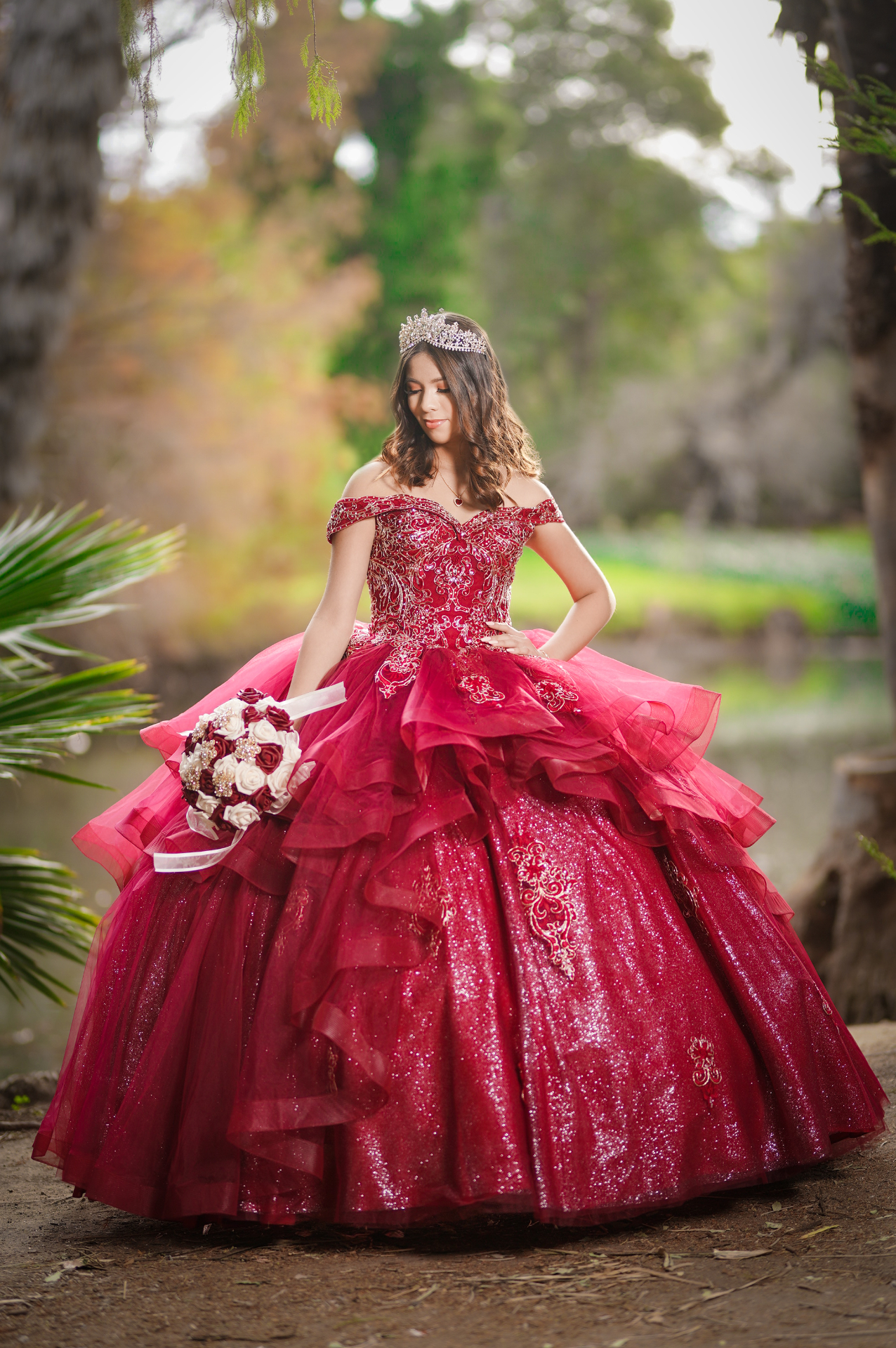 Quinceañera in red ball gown
